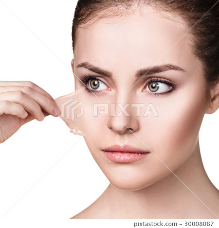 Woman remove her old dry skin from face. Woman remove her old dry skin from face. 30008087