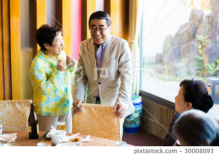 Senior Alumni Association Men and women enjoying the meal Senior Alumni Association Men and women enjoying the meal 30008093