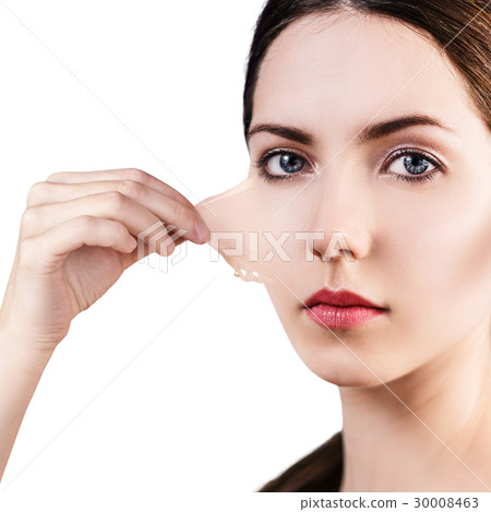 Woman remove her old dry skin from face. 30008463