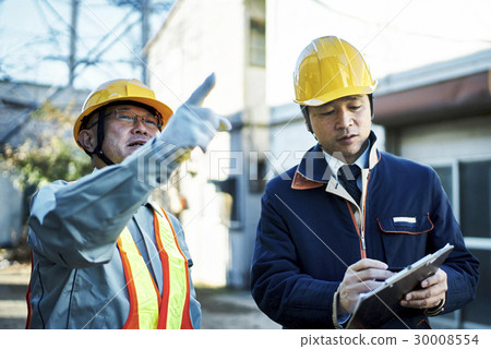 Workers during construction meetings Workers during construction meetings 30008554