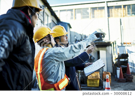 Workers during construction meetings Workers during construction meetings 30008612