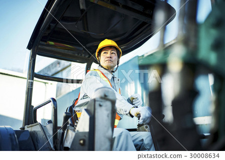 Male driving construction site shovel car Male driving construction site shovel car 30008634