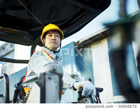 Male driving construction site shovel car 30008678