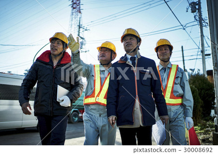 Workers during construction meetings 30008692