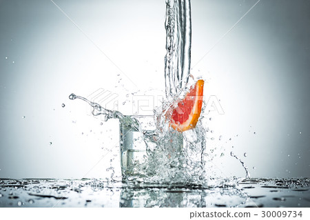 water splash in glass of gray color water splash in glass of gray color 30009734