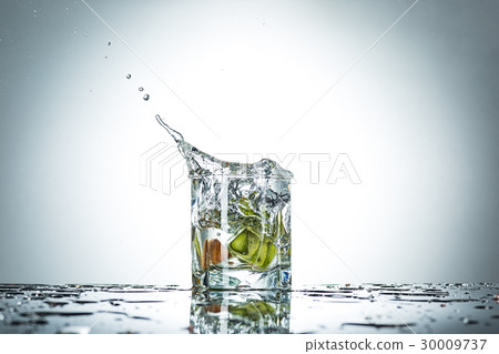 water splash in glass of gray color water splash in glass of gray color 30009737