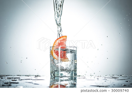 water splash in glass of gray color 30009740
