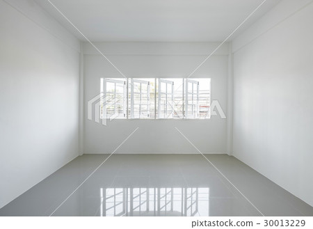 Empty light white room with windows Empty light white room with windows 30013229