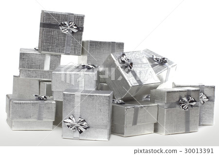 Many silver gifts in a pile on white Many silver gifts in a pile on white 30013391