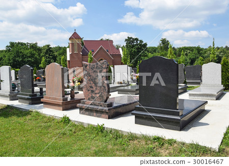 Tombstones and a chapel in the public cemetery 30016467