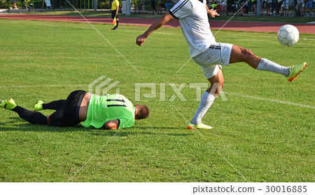 Soccer players in action 30016885