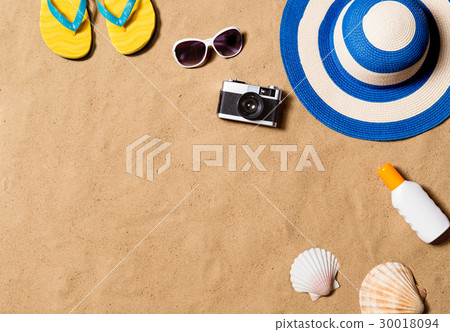 Summer vacation composition. Flip flops, hat and Summer vacation composition. Flip flops, hat and 30018094