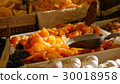 Dried apricot fruit on heap at marketplace. 30018958