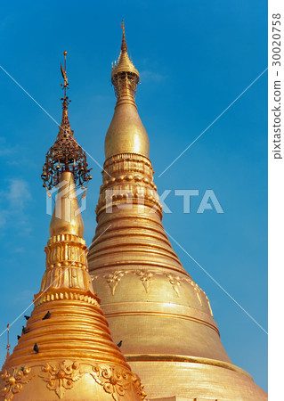 Spire of Myanmar pagoda Shwedagon in Yangon city Spire of Myanmar pagoda Shwedagon in Yangon city 30020758