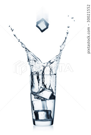 Splash in glass with clear water and flying ice 30021552