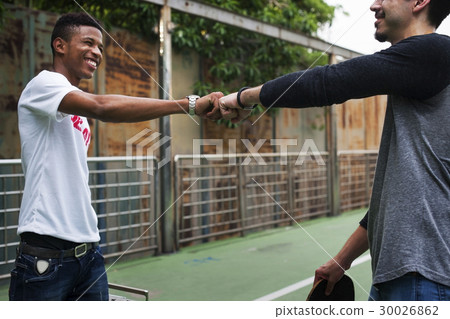 Friendship Fist Bump Greeting Togetherness Youth Culture Concept Friendship Fist Bump Greeting Togetherness Youth Culture Concept 30026862