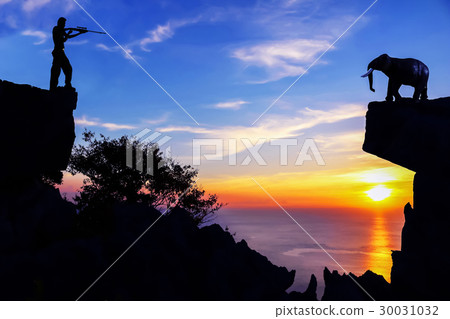 Men shooting elephants. 30031032