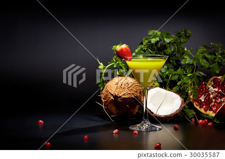 Fresh green smoothie with mango and coconut 30035587