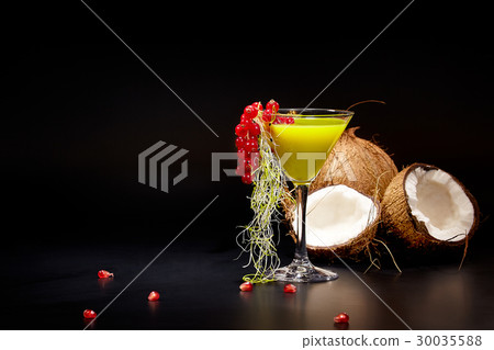 Fresh green smoothie with mango and coconut 30035588