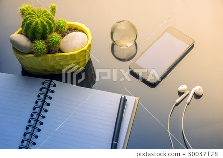 Working with Diary,Smartphone and computer. 30037128