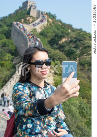 Girl making selfie at the Great wall of China 30039569