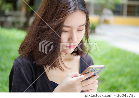thai adult student beautiful girl us smart phone thai adult student beautiful girl us smart phone 30043783