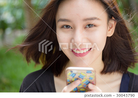 thai adult student beautiful girl us smart phone thai adult student beautiful girl us smart phone 30043790