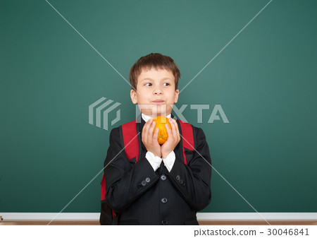 school boy on blackboard, education concept  30046841