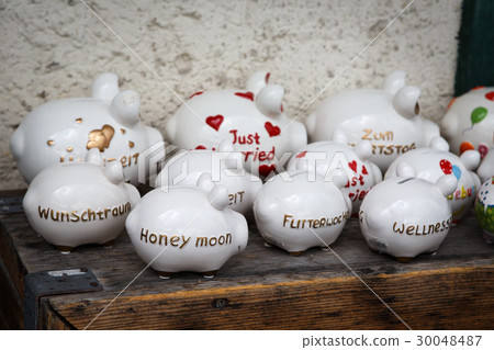 Large group of white piggy banks Large group of white piggy banks 30048487