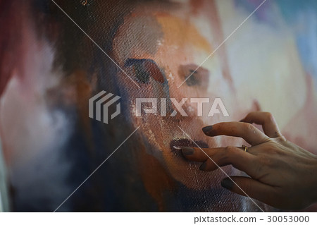 The artist paints a portrait of oil 30053000