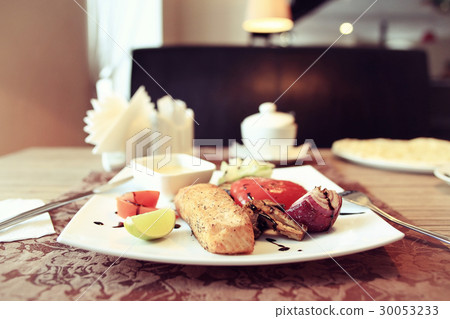 Salmon grill restaurant serving 30053233