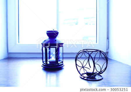 Candle in the candlestick on the windowsill Candle in the candlestick on the windowsill 30053251
