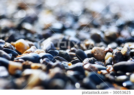 Pebble texture on the river bank 30053625