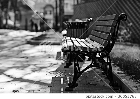 City Trips concept bench in autumn park background 30053765