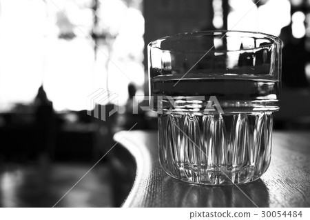 A glass is on the table A glass is on the table 30054484