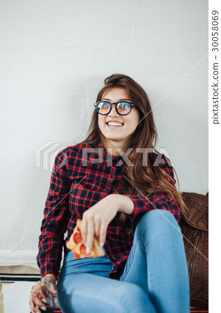 closeup of young girl eating pizza closeup of young girl eating pizza 30058069
