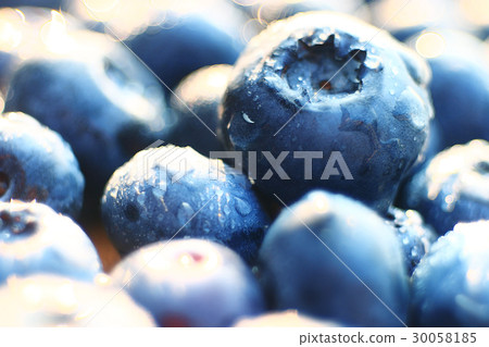 fresh berries blueberries close-up scattered fresh berries blueberries close-up scattered 30058185