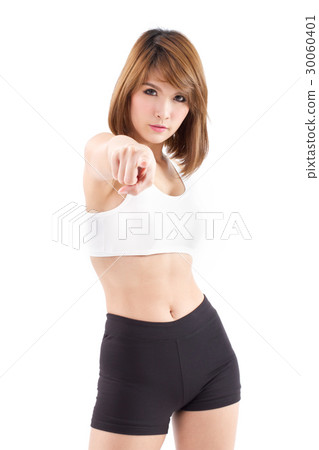 strong sporty woman pointing at you strong sporty woman pointing at you 30060401