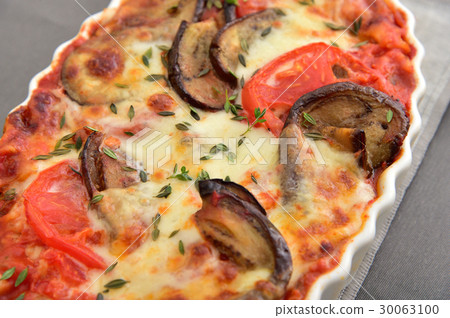 Freshly baked in the oven! Eggplant and tomato lasagna 30063100