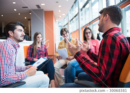 Shot of a group of young business professionals Shot of a group of young business professionals 30068381