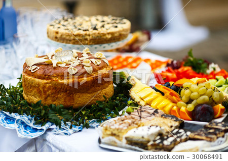 Wedding bread served on plate with greenery 30068491