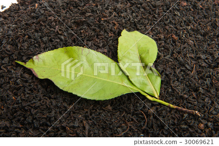 black tea with tea leaf isolated black tea with tea leaf isolated 30069621