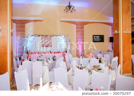 Cosy restaurant decorated in whited 30070297
