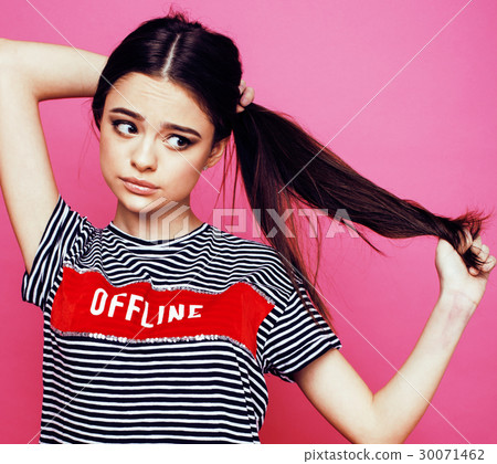 young pretty teenage woman emotional posing on young pretty teenage woman emotional posing on 30071462