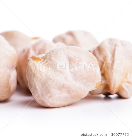 Raw dry chickpeas on white background Raw dry chickpeas on white background 30077753