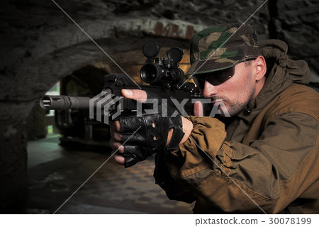 soldier with an automatic assault rifle soldier with an automatic assault rifle 30078199