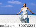 Happy woman on the beach 30078223