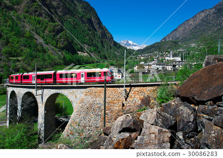 Passage to Brusio Helicidal Viaduct of the Bernina Red Train Passage to Brusio Helicidal Viaduct of the Bernina Red Train 30086283