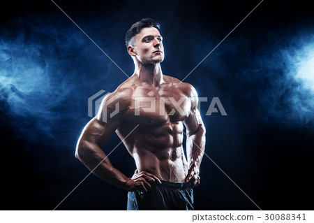 Strong bodybuilder man with perfect abs, shoulders Strong bodybuilder man with perfect abs, shoulders 30088341