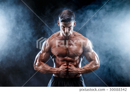 Strong bodybuilder man with perfect abs, shoulders Strong bodybuilder man with perfect abs, shoulders 30088342